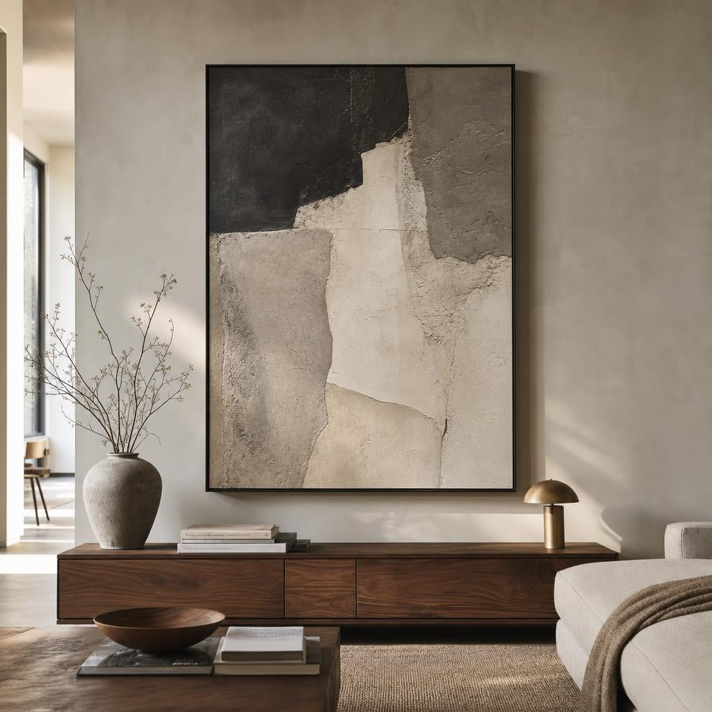 Charcoal cream artwork styled above a console
