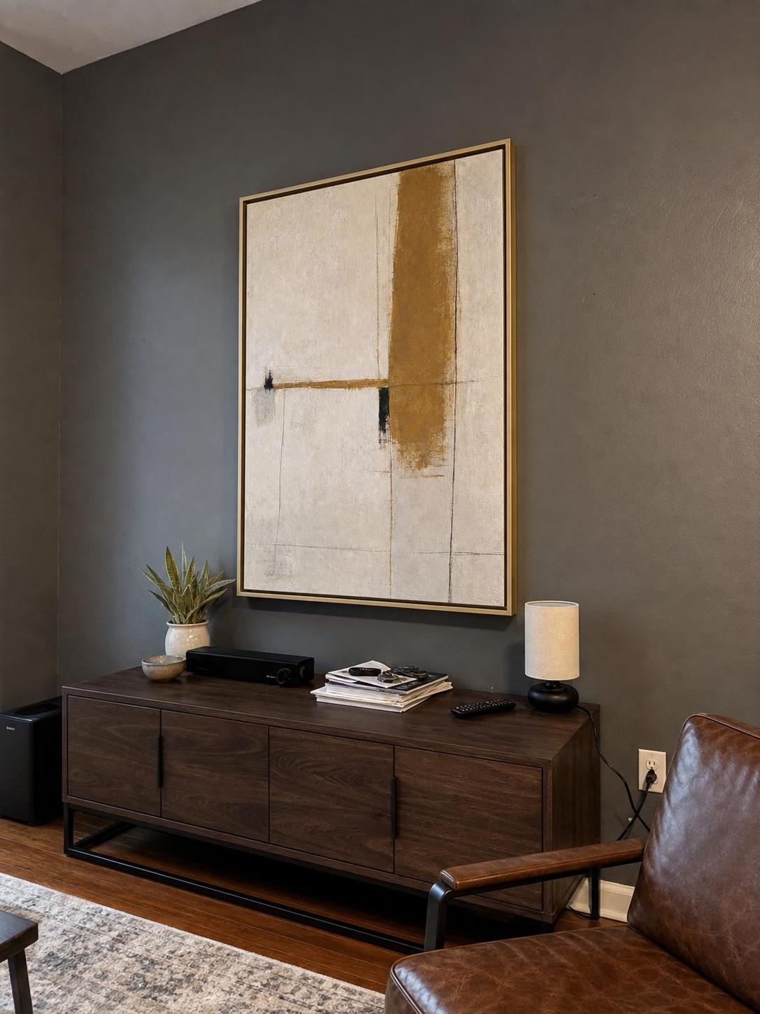 Sunward framed canvas in a casual masculine room